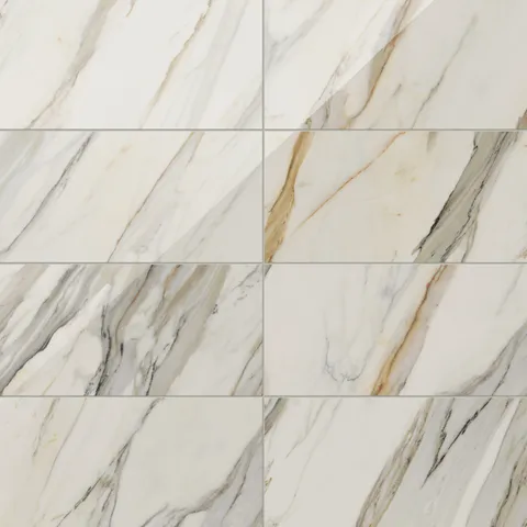 Polished Calacatta Cremo porcelain marble look tile in 12x24 format, featuring taupe and beige veining on a creamy white base for a luxurious finish.