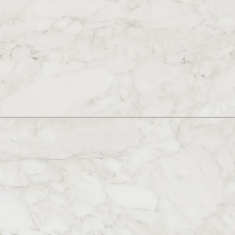 Close-up of Carrara marble look tiles in soft white with light grey veining, perfect for creating a timeless and elegant design.