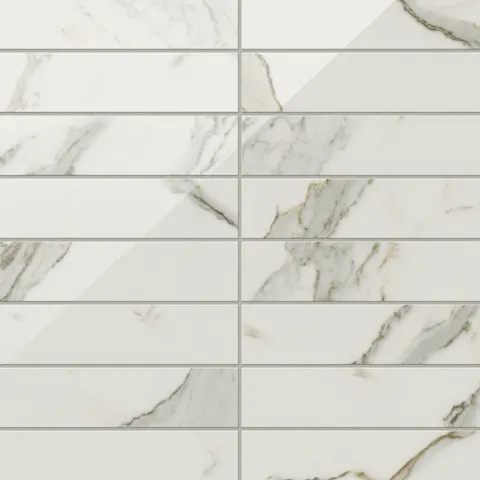 White polished Calacatta marble look subway tiles featuring luxurious light grey and gold veining for a timeless, high-end design.