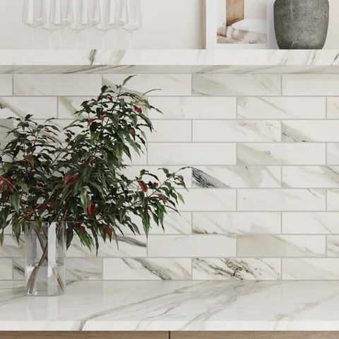 Aniston 3 x 12 Polished Porcelain Tile in Calacatta Cremo