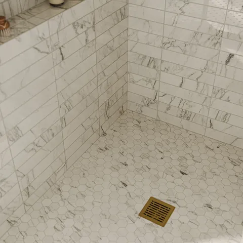 Aniston 3 x 12 Polished Porcelain Tile in Calacatta Quartzite
