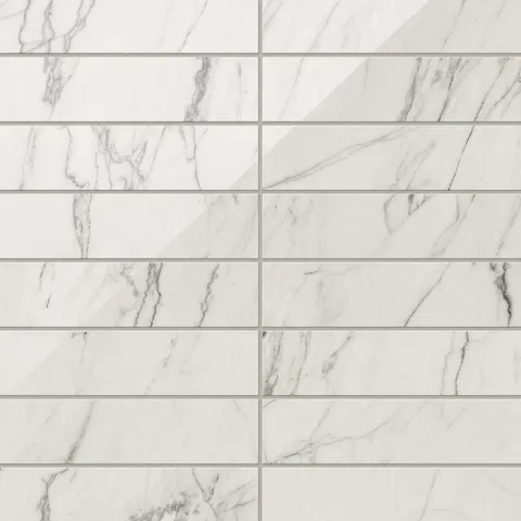 White polished Calacatta quartzite marble look subway tiles with light grey veining, offering a timeless and luxurious aesthetic.