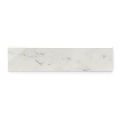 Polished Carrara Bianco 3x12 bullnose marble look tile in white featuring light grey veining, ideal for achieving a seamless and timeless finish.