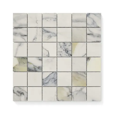 Matte Calacatta Antico 2x2 mosaic marble look tiles featuring a blend of light grey and blue veining, perfect for creating a luxurious and timeless surface.
