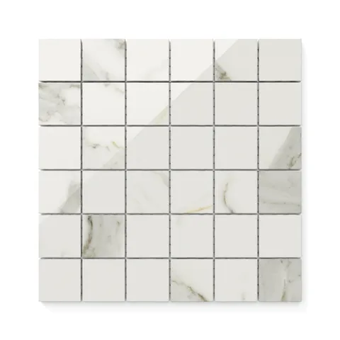 Polished Calacatta Top 2x2 mosaic marble look tiles in white with subtle gold and  light grey veining, delivering a refined and timeless aesthetic