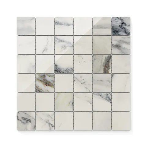 White polished Calacatta Antico 2x2 mosaic marble look tiles with light grey and blue veining, offering a luxurious and contemporary design.