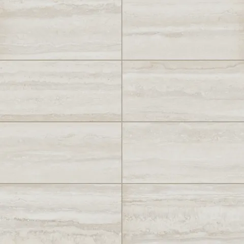 Wren 12x24 matte porcelain tiles in a soft oat hue, showcasing subtle veining and a natural texture for timeless elegance in indoor spaces.