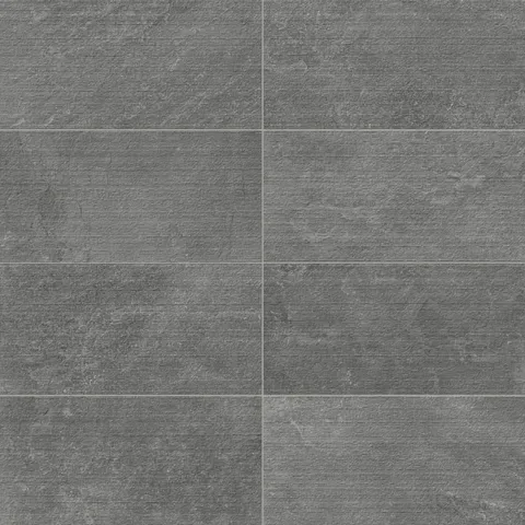 Porcelain tile in a 12x24 format, featuring a deep grey tone with a chiseled texture, ideal for adding bold character to modern spaces.