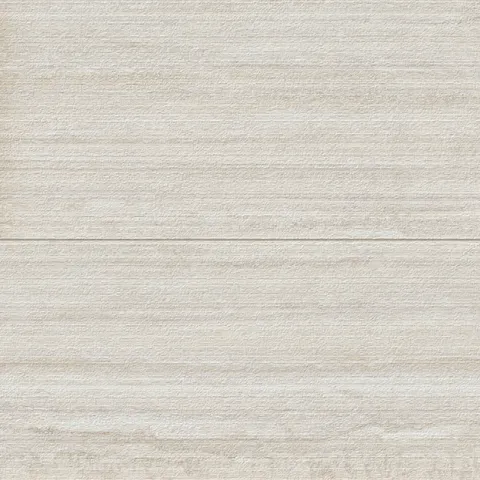 Detailed view of Wren 24x48 chiseled porcelain tiles in oat, showcasing a subtle texture and warm creamy hues for a refined and modern aesthetic.