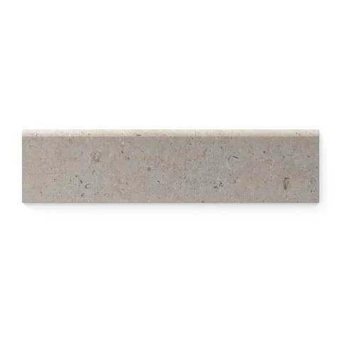 Wren Dune 3x12 matte porcelain bullnose tile, showcasing its smooth beige tone and refined edges for seamless transitions in modern designs.