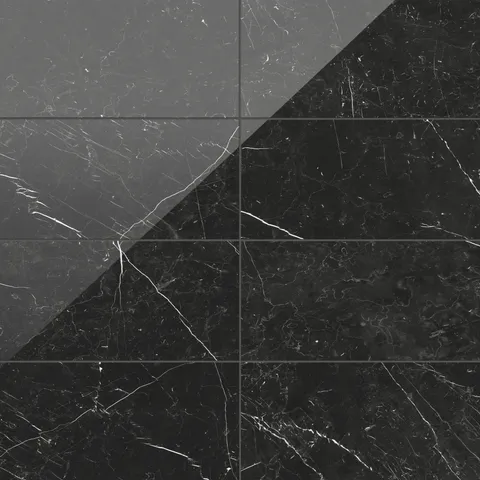 Leona 12x24 polished porcelain tile in Nero Marquina, showcasing a sleek black surface with dramatic white veining.