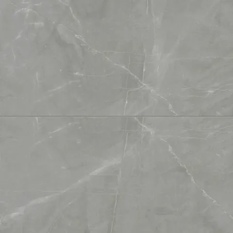 Leona Amani Grey tile, 24x48 matte finish, showcasing a soft grey marble-look with subtle veining for a modern, sophisticated aesthetic.