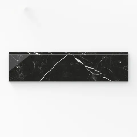 Leona Nero Marquina 3x12 bullnose polished tile showcases black marble with striking white veining, ideal for refined edge detailing.