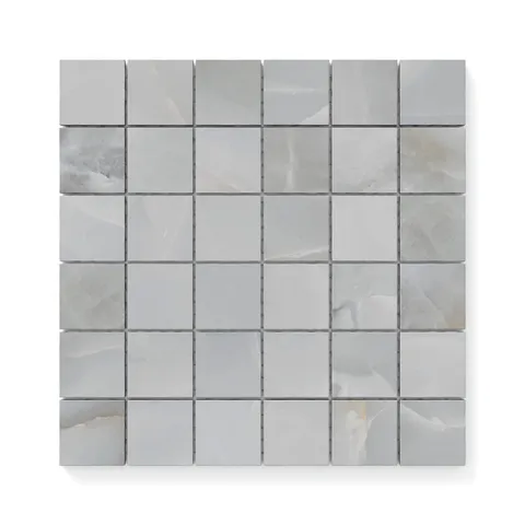 Astrid 2x2 matte porcelain mosaic tile in Slate, showcasing a soft gray palette with subtle veining for a modern and sophisticated look.