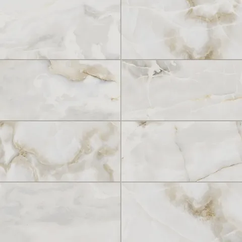 Astrid 12x24 matte porcelain tile in Pearl, showcasing its luminous white tones with soft golden veining for a luxurious look.