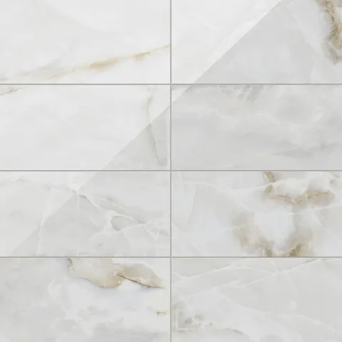 Astrid 12x24 polished porcelain tile in Pearl, showcasing a glossy surface with elegant veining and a natural marble-like design.