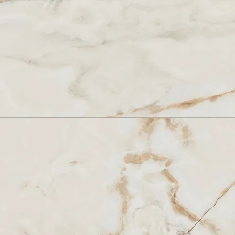 Astrid 24x48 matte porcelain tile in alabaster, featuring a soft cream finish with golden and beige veining patterns.
