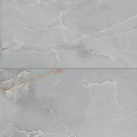 Astrid 24x48 matte porcelain tile in slate, showcasing cool gray hues with soft white veining and subtle golden accents for a sophisticated stone-like look.