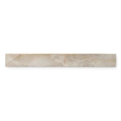 Astrid 3x24 polished porcelain bullnose tile in sand, showcasing a warm beige tone with subtle veining and a smooth, polished edge.