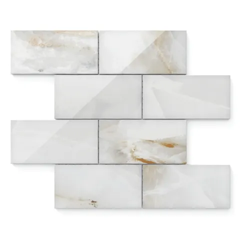 Astrid 3x6 polished porcelain mosaic tile in pearl, showcasing elegant white and beige tones with a glossy finish.
