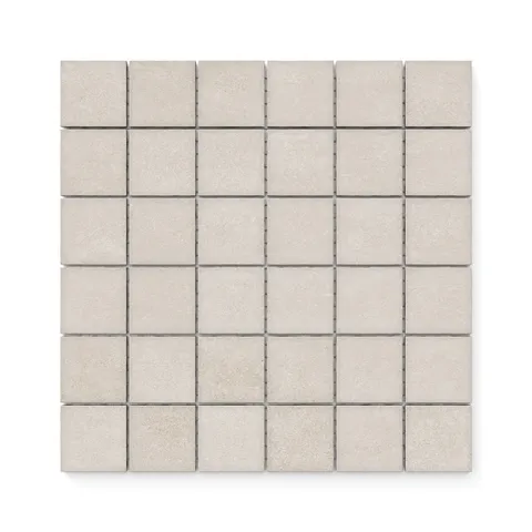 Neutral Wyatt Dune 2x2 matte mosaic tiles showcasing a soft, textured finish, perfect for creating subtle elegance in any space.