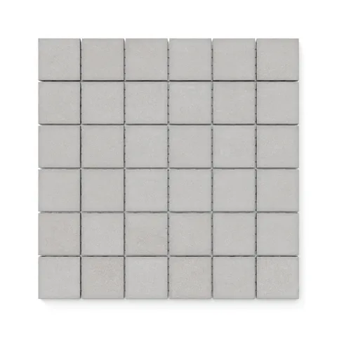 Subtle fog-toned 2x2 mosaic tiles in a matte finish, offering a refined blend of soft grays perfect for modern and minimalist spaces.