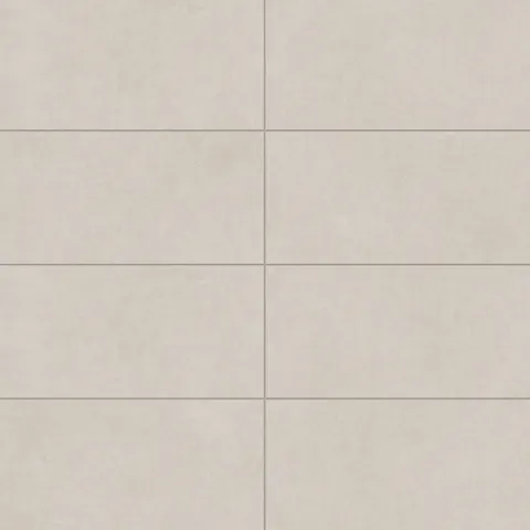 Wyatt Dune 12x24 matte porcelain tiles, showcasing a soft beige tone with subtle texture, perfect for creating elegant and versatile spaces.
