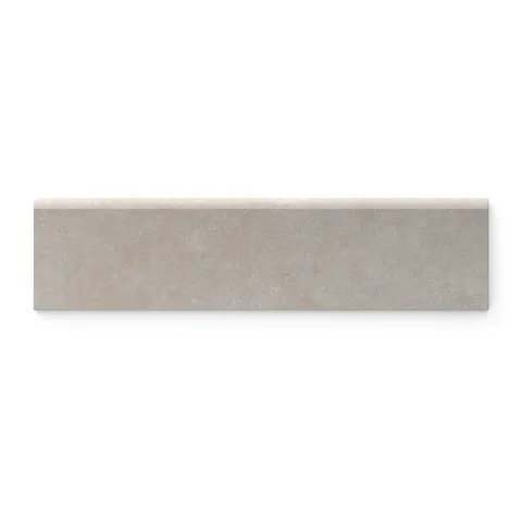Subtle stone-textured Wyatt 16x32 matte porcelain bullnose tile in Ash, offering a soft, natural finish for versatile and contemporary design aesthetics.