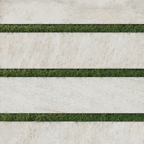 Carter Stone 12x48 Matte Pavers, showcasing beige tones with natural stone-like textures and grass inlays for a contemporary outdoor aesthetic.