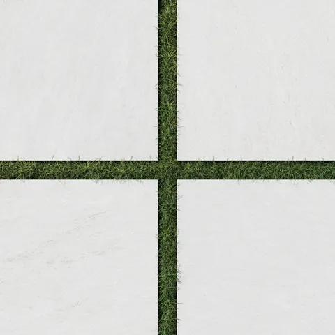 Carter Ash 24x24 Matte Porcelain Pavers, 2cm thick, showcasing a clean white surface with subtle natural variations, paired with grass for a minimalist outdoor design.