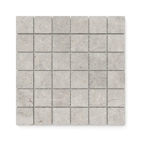 Porcelain mosaic tile in a 2x2 format, featuring a soft taupe tone with subtle veining and a matte finish, perfect for elegant wall or floor designs.