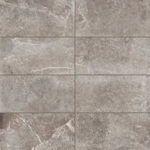 Sophisticated 12x24 porcelain tiles in a matte finish, showcasing brown tones and natural veining for a contemporary and refined look.