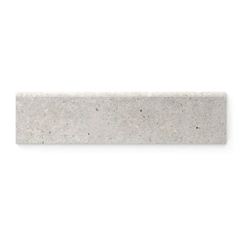 Porcelain bullnose trim tile in a 3x12 format, showcasing a soft taupe finish with delicate texture and a matte sheen, ideal for refined edge detailing.