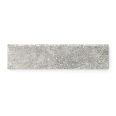 Modern 3x12 bullnose trim tile in gray with a matte finish, offering refined veining and a seamless edge for elegant detailing.