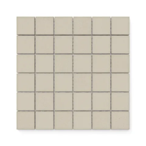 Palmer 2x2 matte porcelain mosaic tile in natural beige, showcasing a warm tone and grid-like pattern ideal for versatile designs.