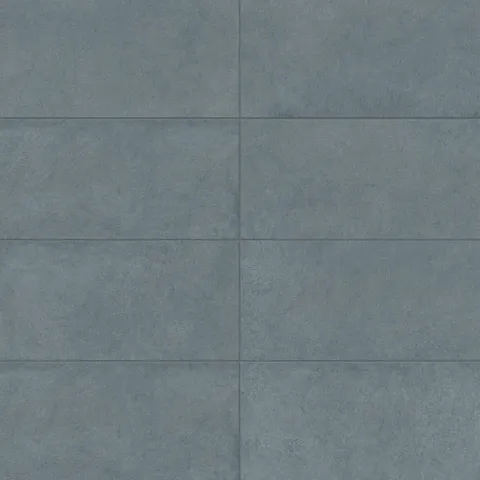 Palmer 12x24 matte porcelain tile in blue, showcasing a soft textured surface and rich blue tones for versatile indoor and outdoor designs.