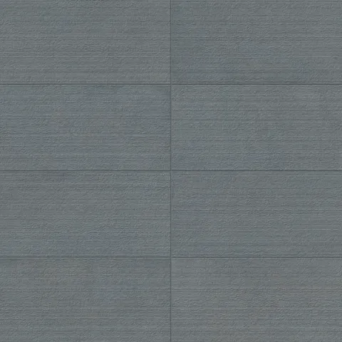 Palmer 12x24 chiseled porcelain tile in ocean blue, featuring a textured surface and deep blue hues for a modern aesthetic.
