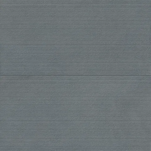 Palmer 24x48 chiseled porcelain tile in ocean blue, displaying a rich blue texture with linear details for a bold, modern aesthetic.