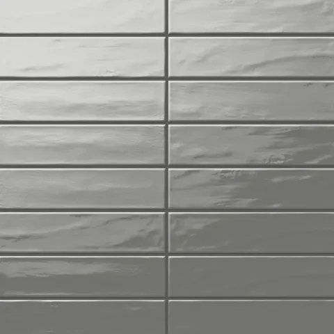 Palmer 3x12 glossy porcelain tile in mineral, offering a smooth gray-green shade with a lustrous finish for timeless interiors.