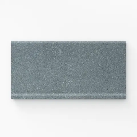 Palmer 6x12 matte porcelain cove base tile in blue, showcasing a rich and calming tone for serene interiors.