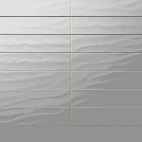 Palmer 6x24 glossy porcelain tile in grey, showcasing a sleek neutral tone ideal for contemporary interiors.