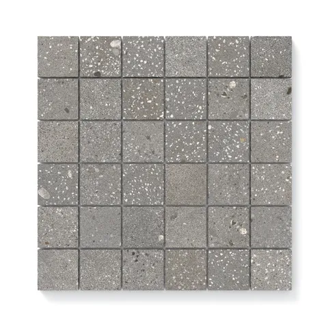 Sloane Pebble 2x2 matte tiles showcase a speckled concrete-like texture with a versatile gray palette, perfect for contemporary spaces.
