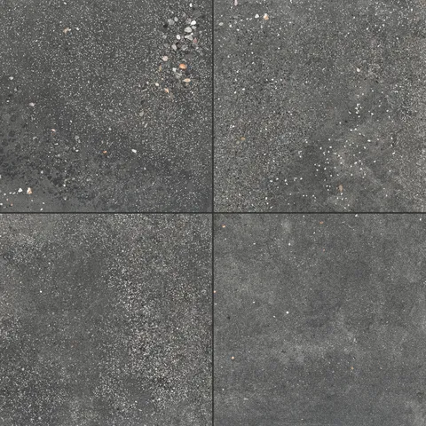 Sloane 24x24 matte porcelain tile in Charcoal, featuring a bold dark tone with intricate speckling, ideal for modern, industrial-inspired spaces.