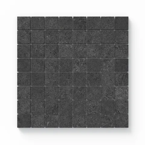 A close-up of Adeline Midnight 1.5x1.5 Matte mosaic tiles, showcasing their deep black tone, textured surface, and seamless grid arrangement.