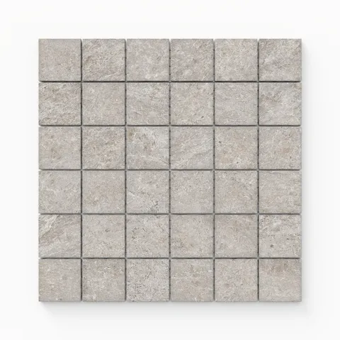 Dawson 2x2 Matte Porcelain Mosaic Tile in Dune, showcasing a warm and textured finish for versatile design applications.