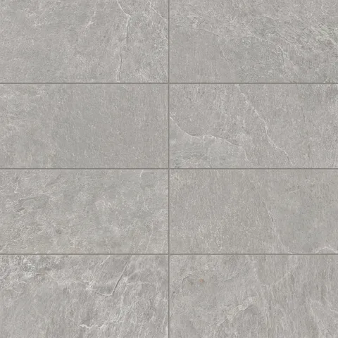 Dawson 12x24 Matte Porcelain Tile in Ash, showcasing a textured gray finish with natural stone-inspired patterns.
