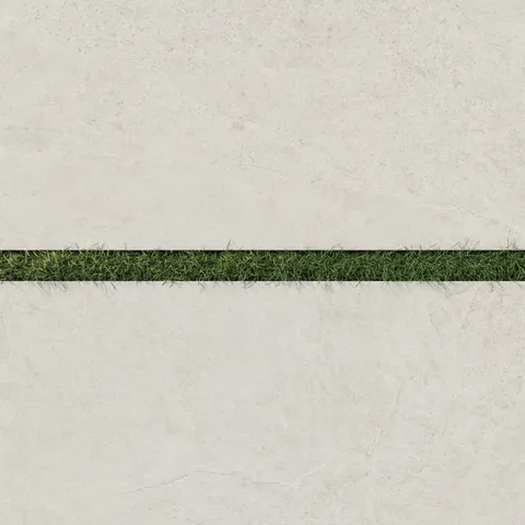 Dawson 24x48 Grip Porcelain 2cm Paver Tile in Alabaster, featuring a smooth textured surface with grass-filled joints for a modern outdoor look.