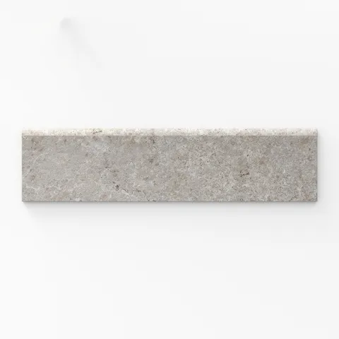 Dawson 3x12 Matte Porcelain Bullnose Tile in Dune, highlighting its warm neutral tones and subtle texture.