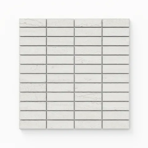 Soft off-white matte porcelain mosaic tiles with a 1x3 vein-cut design, radiating understated elegance for contemporary interiors.