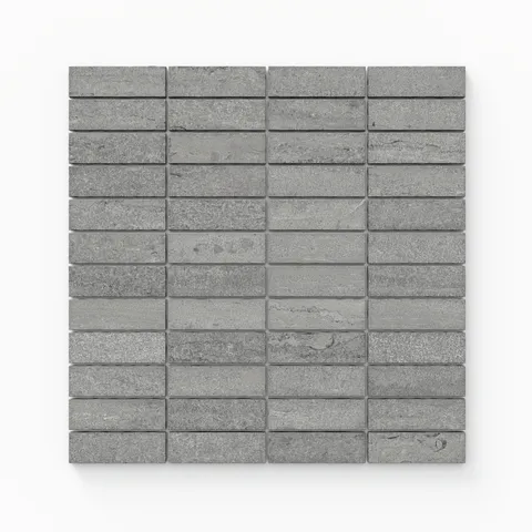 Matte porcelain mosaic tiles in a refined dark gray hue, showcasing a 1x3 vein-cut design, perfect for adding modern texture to any space.
